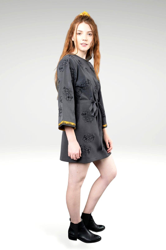 ABIGAIL FLORAL EMBROIDERED DRESS - zohaonline side view on the model- worn belted with boots