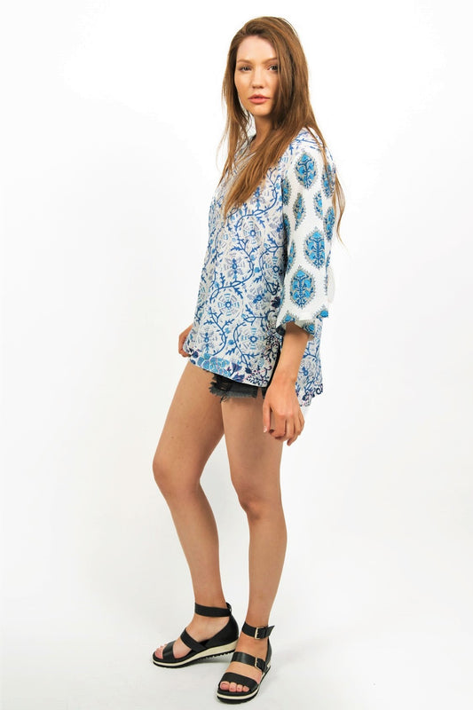 ANNISA PRINTED TOP -SIDE VIEW ON MODEL-WORN WITH SHORTS AND BLACK SANDALS- zohaonline