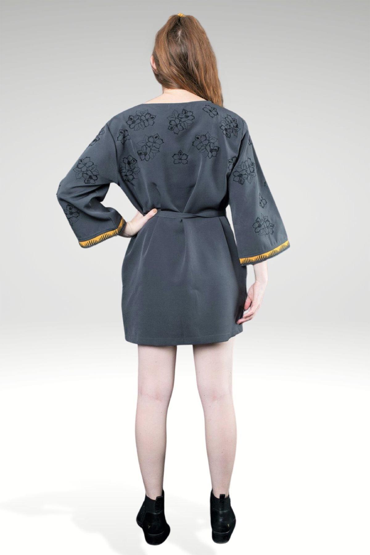 ABIGAIL FLORAL EMBROIDERED DRESS - zohaonline - Back view on the model- worn belted with boots
