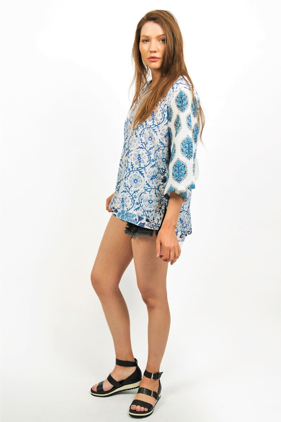 ANNISA PRINTED TOP -SIDE VIEW ON MODEL-WORN WITH SHORTS AND BLACK SANDALS- zohaonline