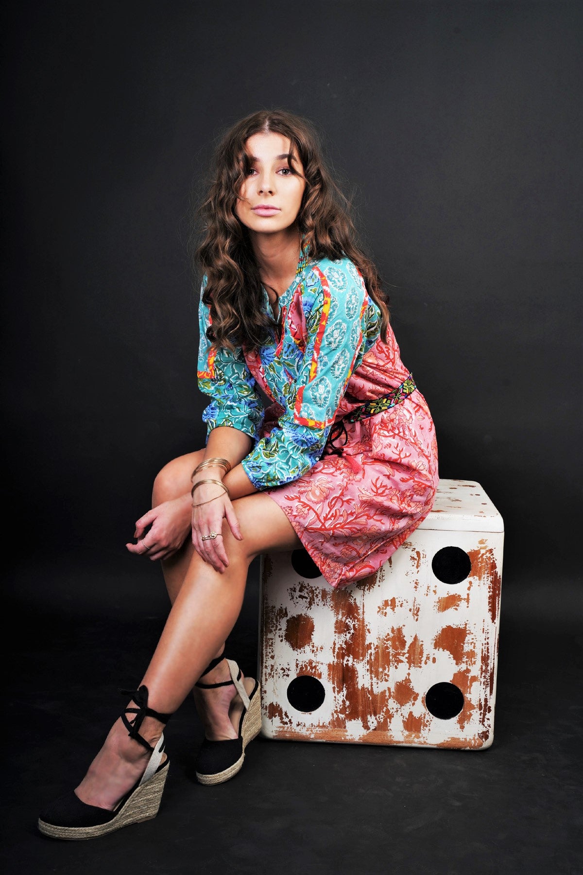 MEADOW FLORAL PATCHWORK DRESS - zohaonline- MODEL SITTING ON CUBE STOOL
