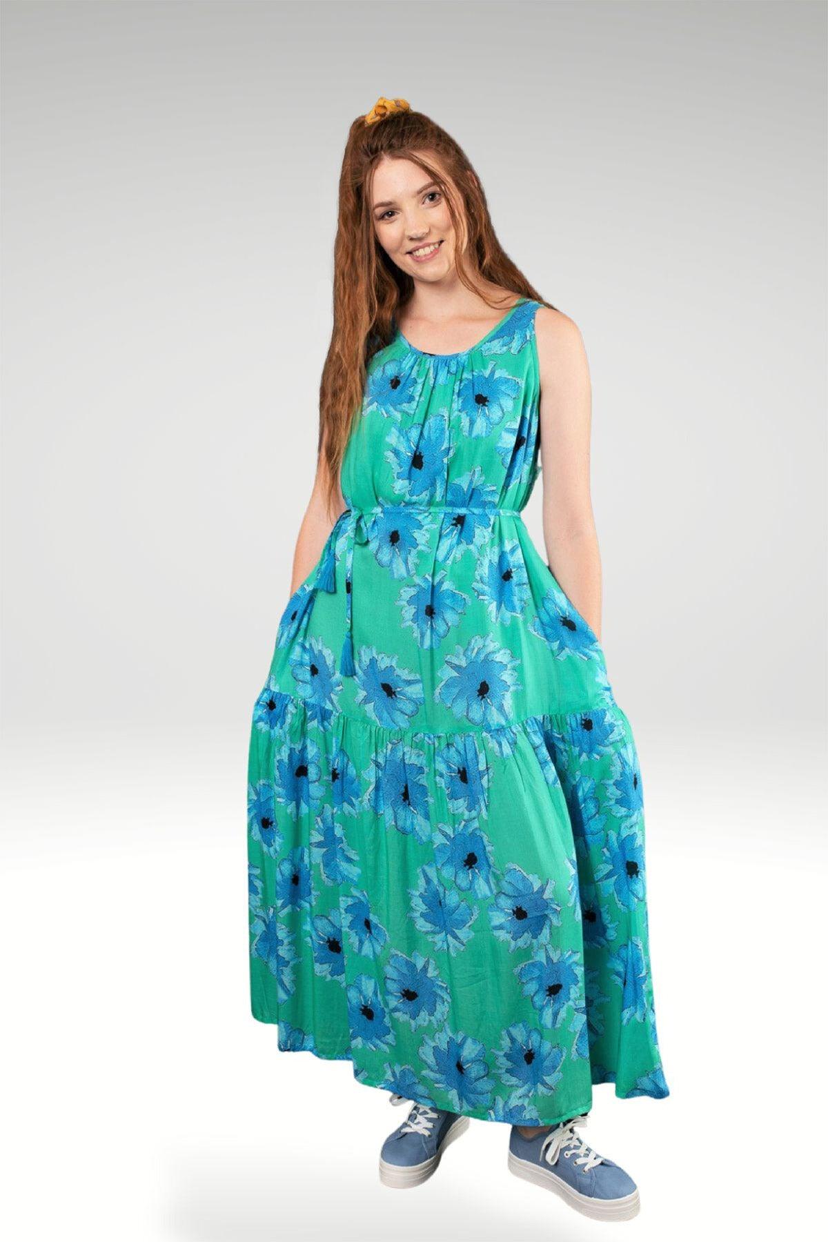 FRONT VIEW ON MODEL FOR MINT COLOURWAY OF LARA FLORAL TIER MAXI DRESS WITH POCKETS AND TIE WITH  TASSELS- zohaonline