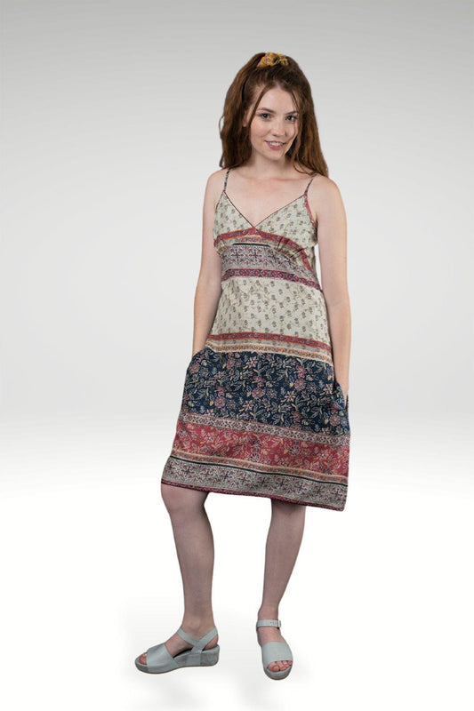 model wearing NAHAL PRINTED SLIP DRESS with straps, pockets and a pretty print- zohaonline