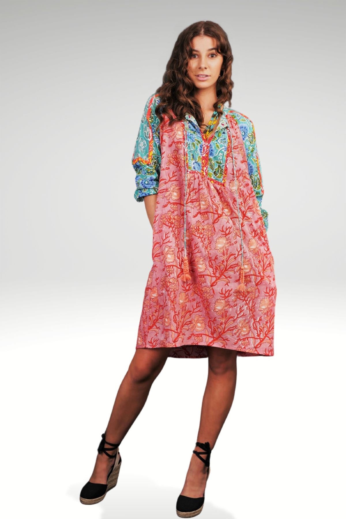 FRONT VIEW OF MEADOW FLORAL PATCHWORK DRESS WITH TASSEL TIES ON NECK - zohaonline