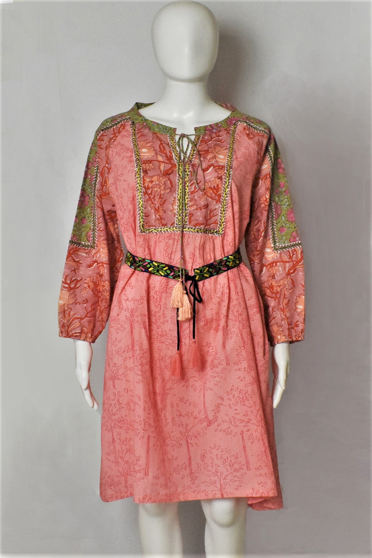 MEADOW FLORAL PATCHWORK DRESS - Peach /Pink colorway- woodblock prints that scream summer come together in this light cotton dress that looks awesome in this image. Touch of hand embroidery detail in bright yellow looks great on peachy pink, red and brown print colours.  paired with luda belt