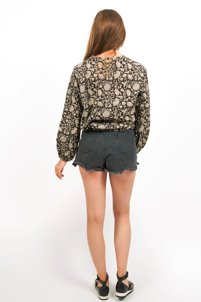 BACK VIEW ON MODEL WEARING SABLE TOP WITH SHORTS- zohaonline