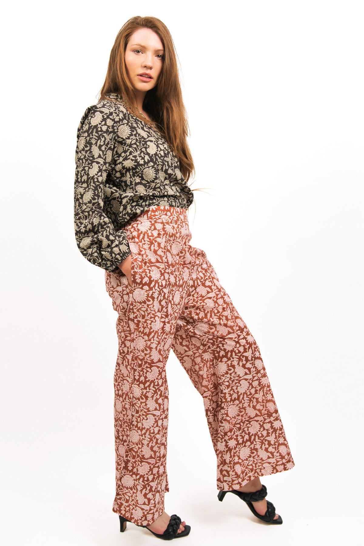 MODEL WEARING SABLE TOP TUCKED IN AMBER PANTS- zohaonline