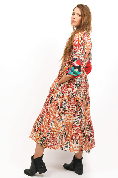 TOZI PRINTED TIERED MAXI DRESS - zohaonline WORN WITH HANDS IN POCKET AND SIDE LOOK