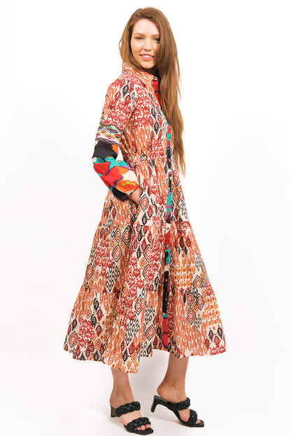 side view- model wearing TOZI PRINTED TIERED MAXI DRESS with heels - zohaonline