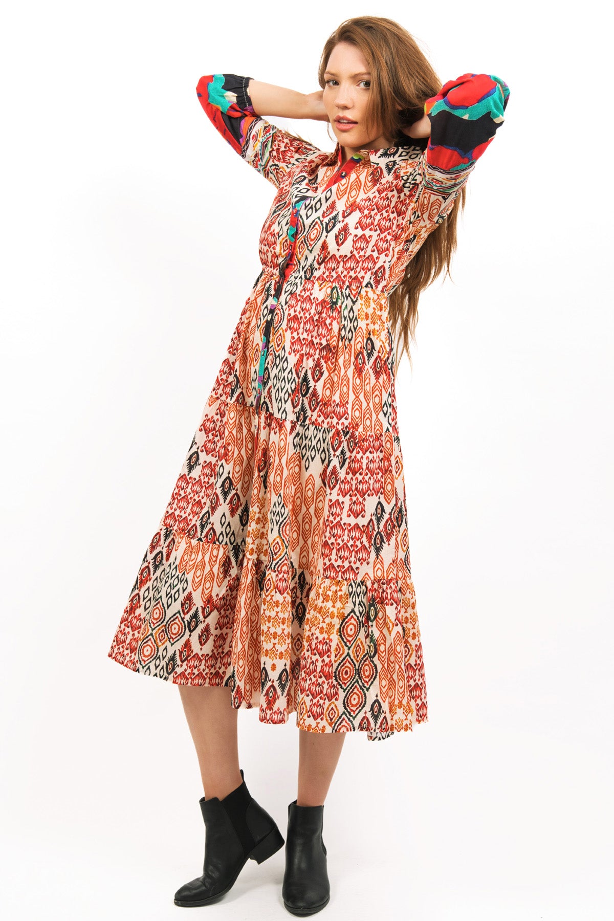 MODEL FIXING HER HAIR WEARING TOZI PRINTED TIERED MAXI DRESS - zohaonline