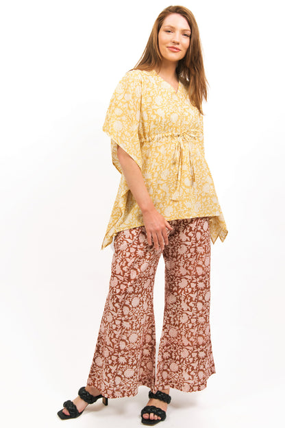 AMBER FLARE PANTS  LOOKS AWESOME ON MODEL PAIRED WITH ZINNIA KAFTAN IN PALE YELLOW COLOUR- zohaonline